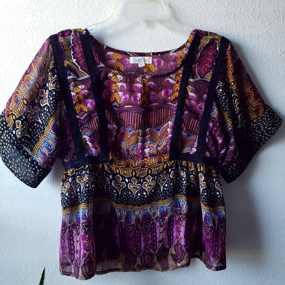 Empire waisted peek-a-boo top